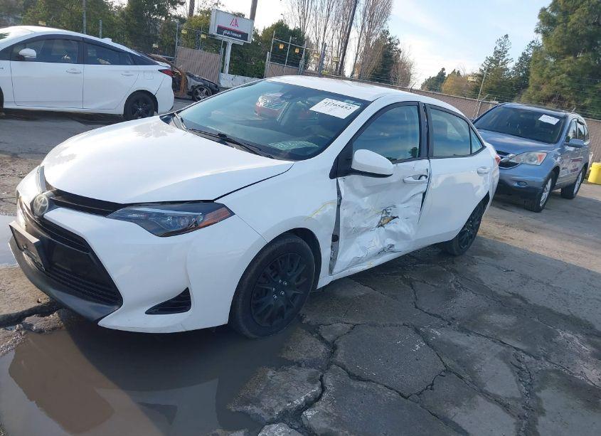 Photo 2 of 2017 Toyota Corolla LE (VIN 2T1BURHEXHC933214)