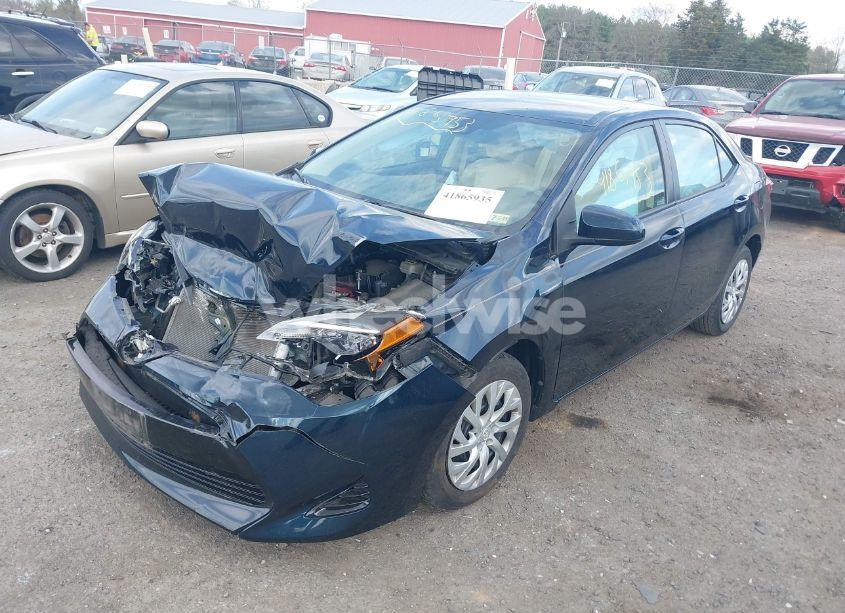 Photo 2 of 2017 Toyota Corolla LE (VIN 2T1BURHEXHC935285)