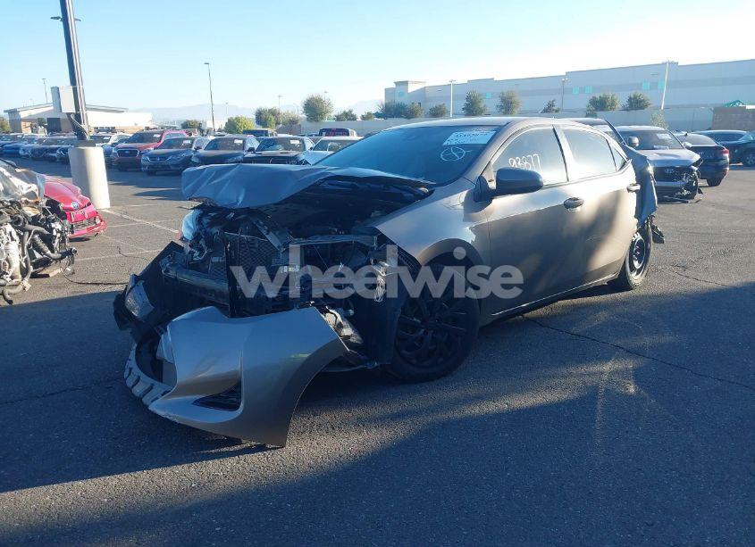 Photo 2 of 2017 Toyota Corolla LE (VIN 2T1BURHEXHC940342)