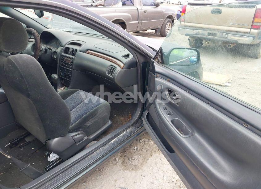 Photo 5 of 2000 Toyota Camry SOLARA SE (VIN 2T1CG22PXYC322550)