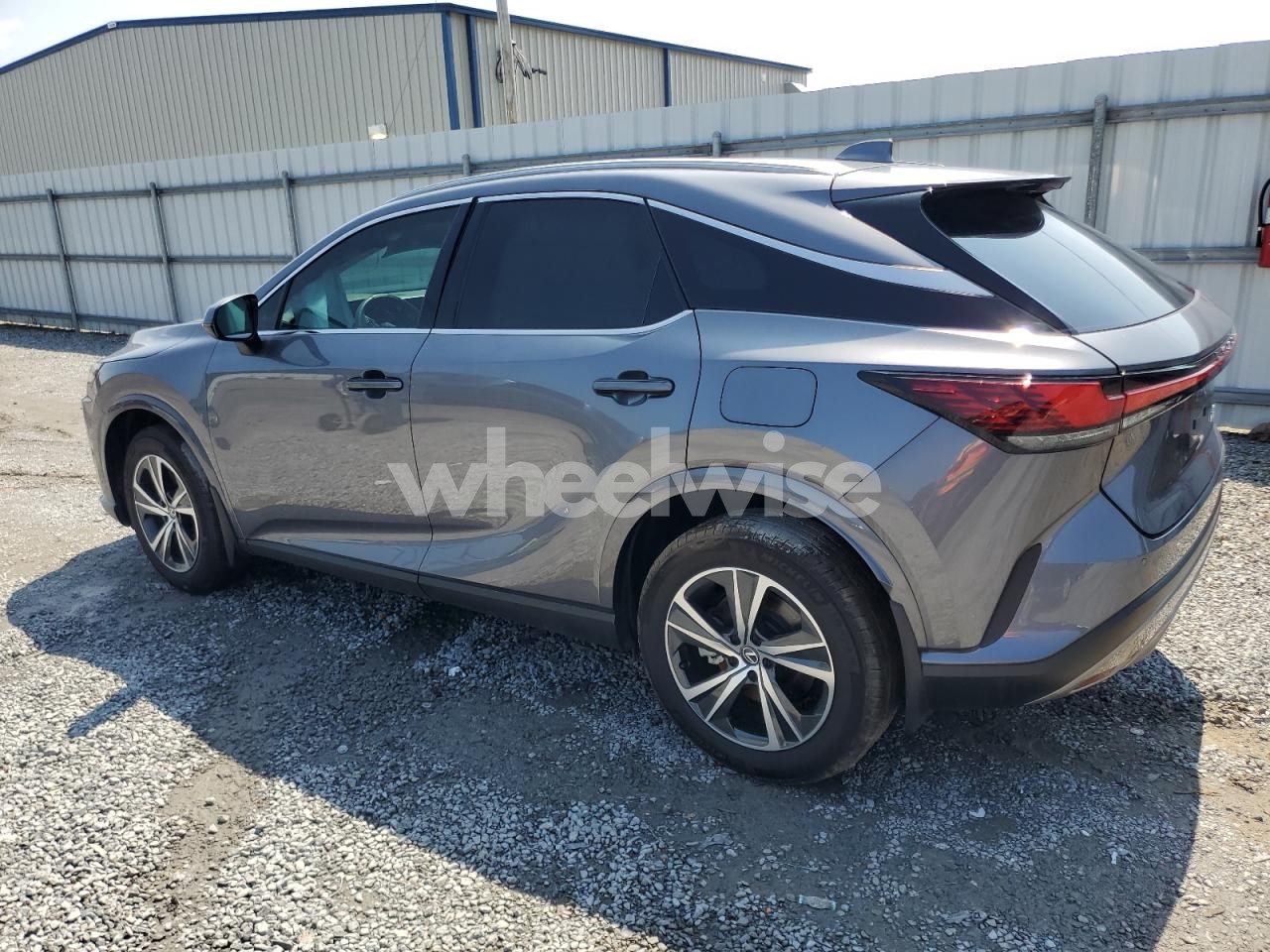Photo 2 of 2023 LEXUS RX 350H BASE (VIN 2T2BBMCAXPC020654)