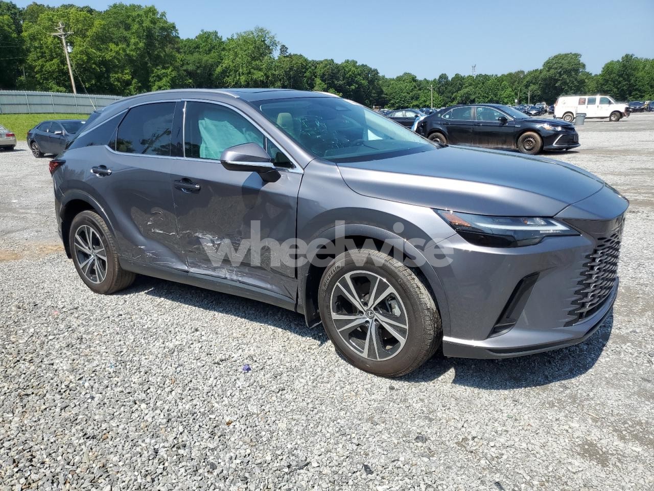 Photo 4 of 2023 LEXUS RX 350H BASE (VIN 2T2BBMCAXPC020654)