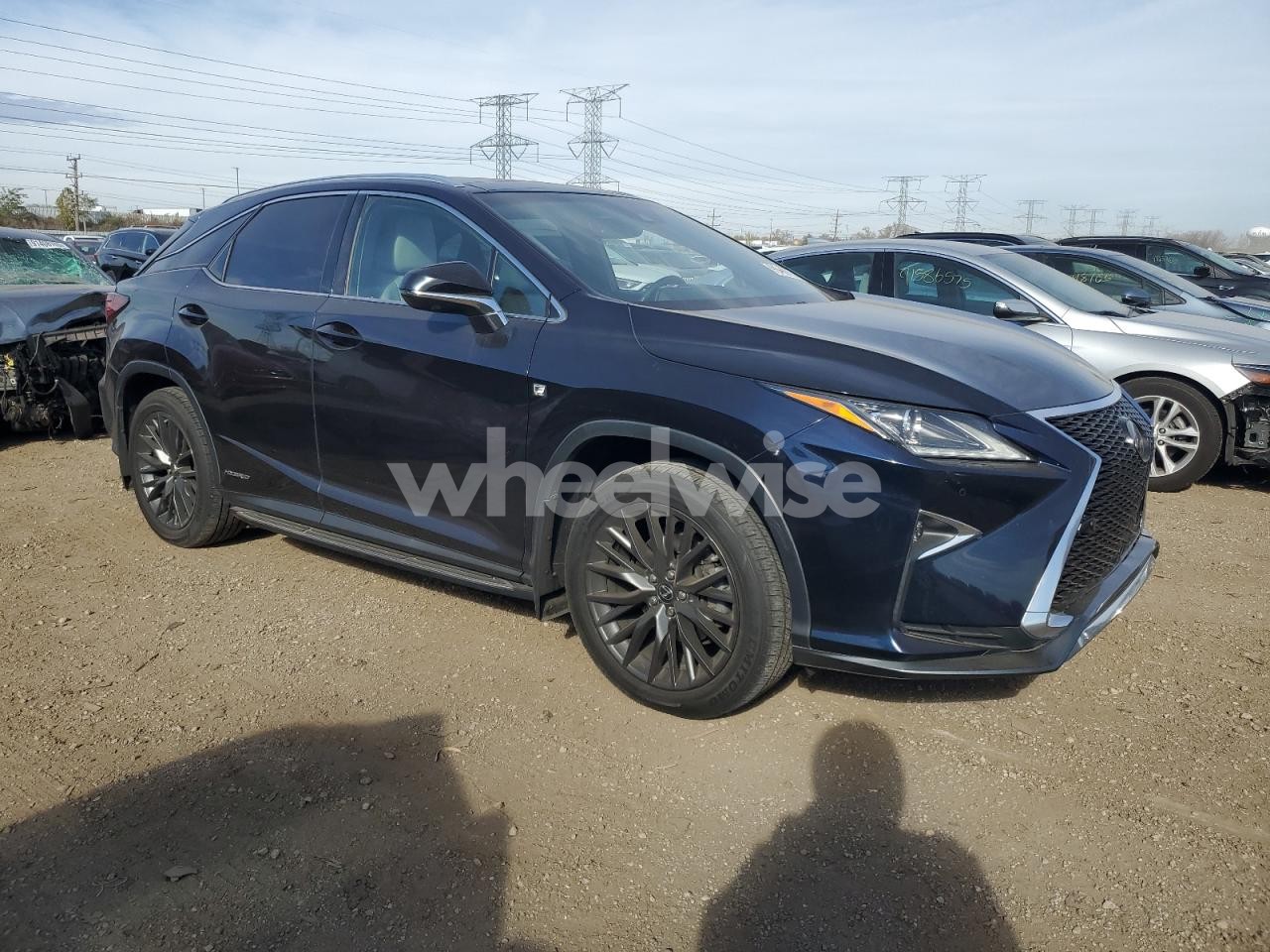 Photo 4 of 2019 LEXUS RX 450H BASE (VIN 2T2BGMCA9KC035687)