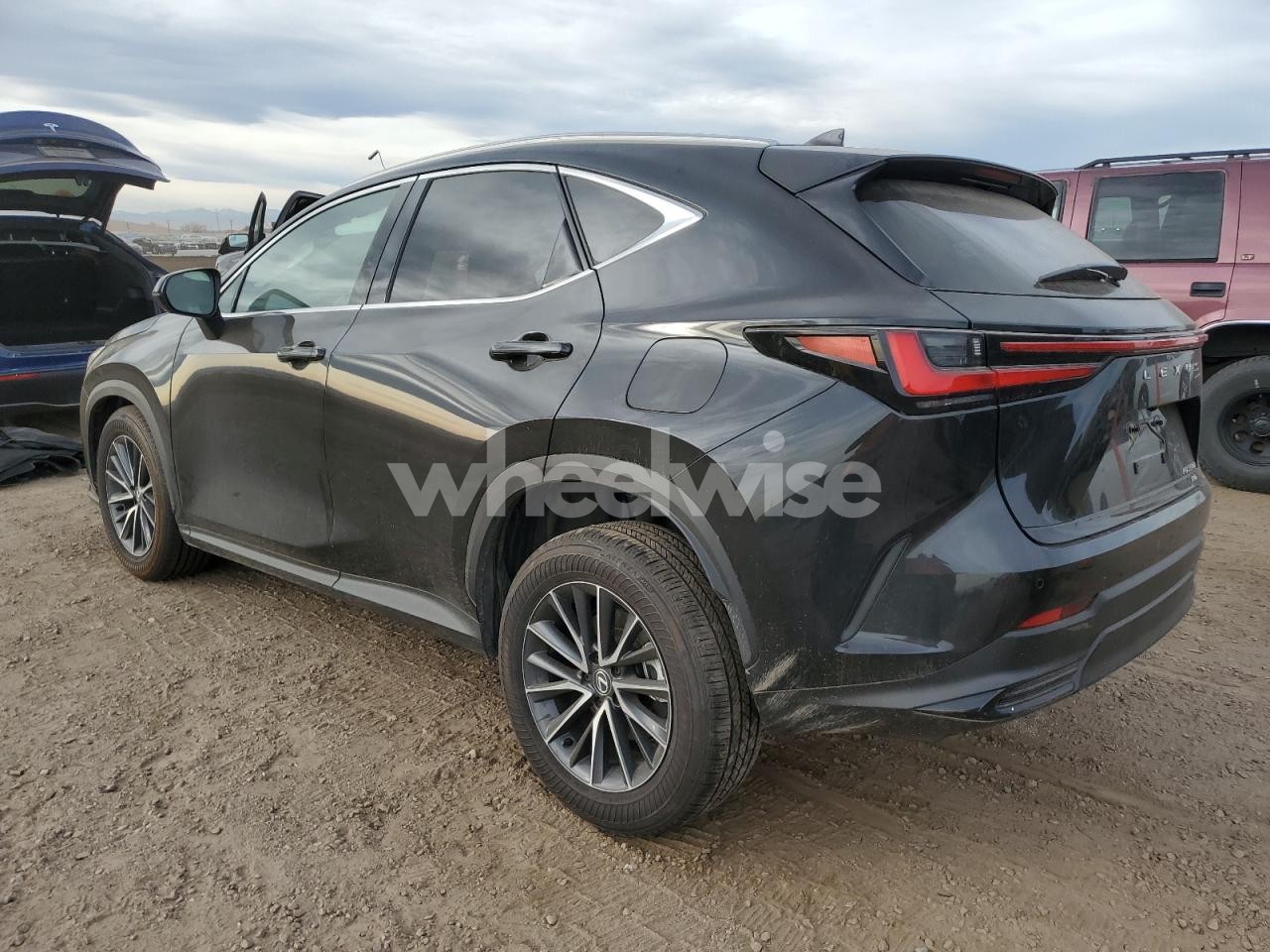 Photo 2 of 2024 LEXUS NX 350H BASE (VIN 2T2GKCEZ2RC019097)