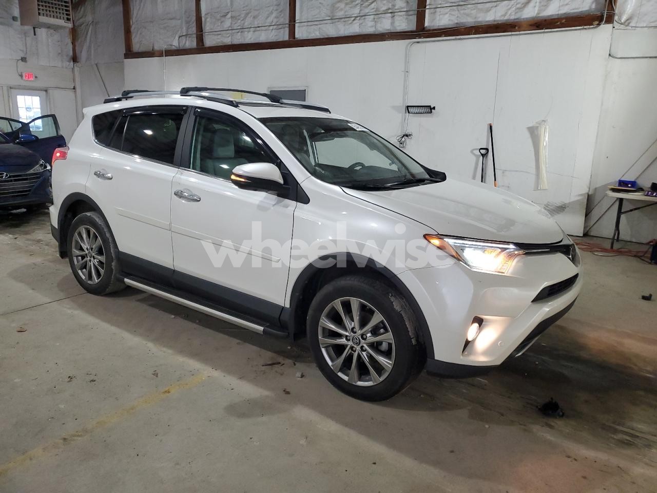 Photo 4 of 2017 TOYOTA RAV4 LIMITED (VIN 2T3DFREV8HW618554)