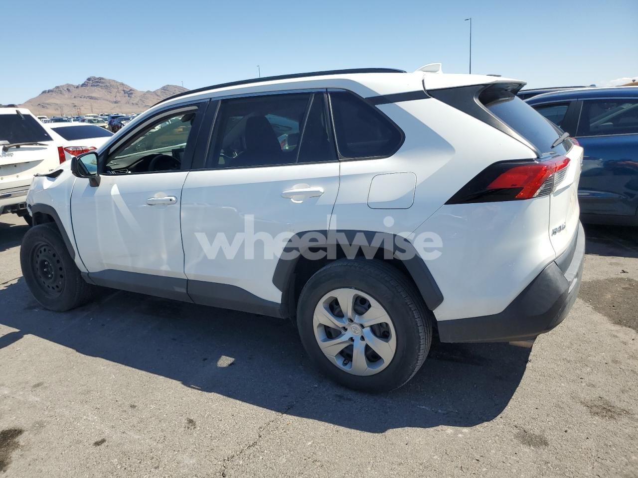 Photo 2 of 2021 TOYOTA RAV4 LE (VIN 2T3F1RFVXMW196092)