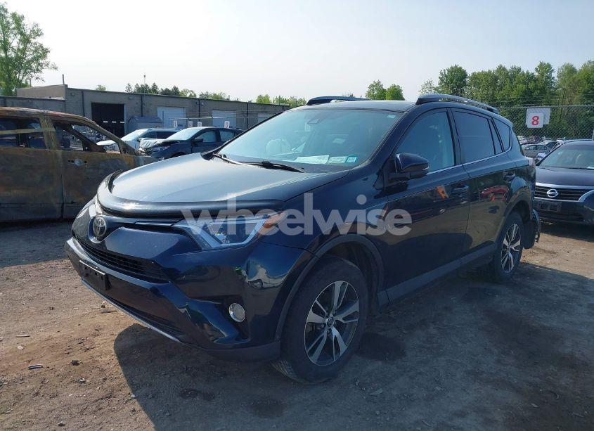 Photo 2 of 2018 Toyota Rav4 XLE (VIN 2T3RFREV0JW704159)