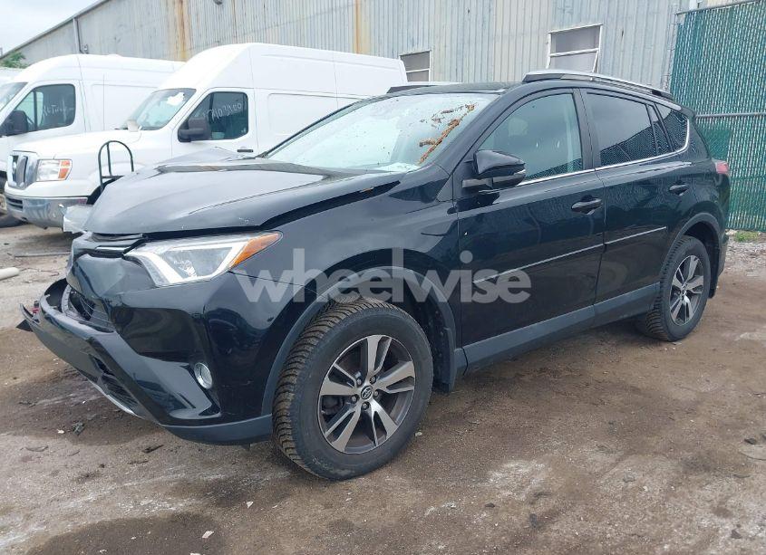 Photo 2 of 2018 Toyota Rav4 XLE (VIN 2T3RFREV0JW750610)