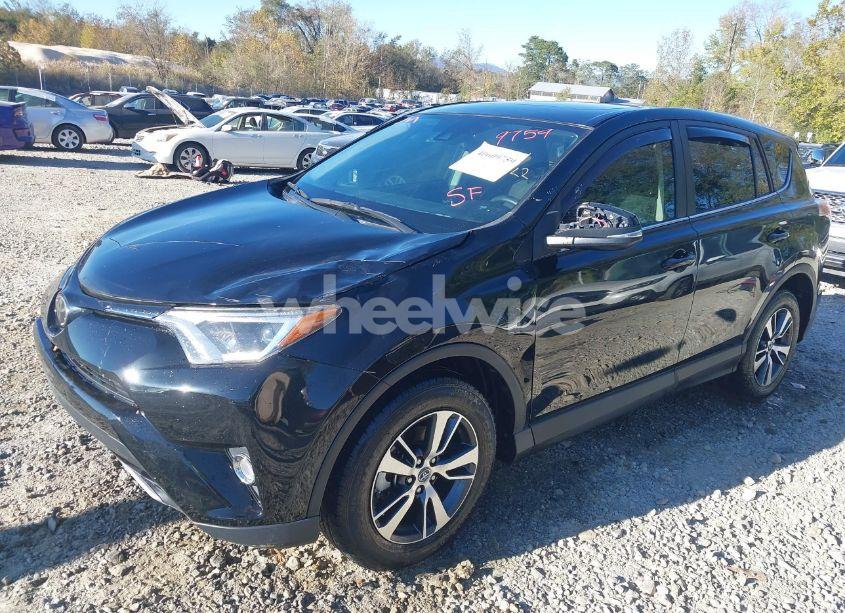 Photo 2 of 2018 Toyota Rav4 XLE (VIN 2T3RFREV0JW852845)