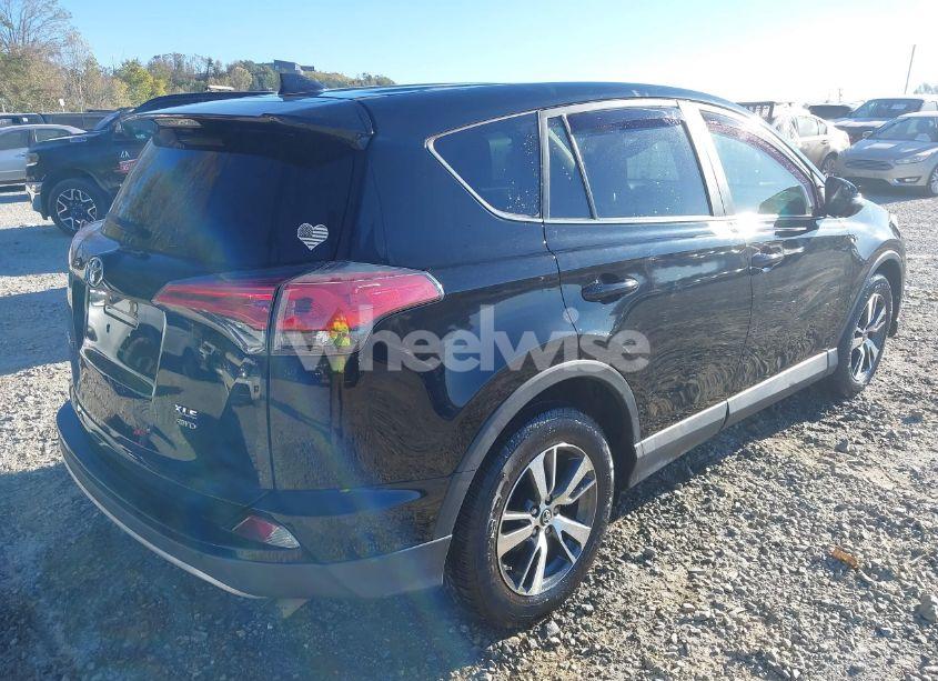 Photo 4 of 2018 Toyota Rav4 XLE (VIN 2T3RFREV0JW852845)