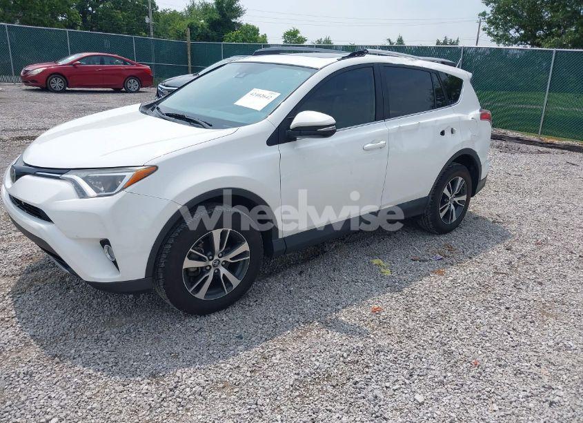 Photo 2 of 2018 Toyota Rav4 XLE (VIN 2T3WFREV0JW424275)
