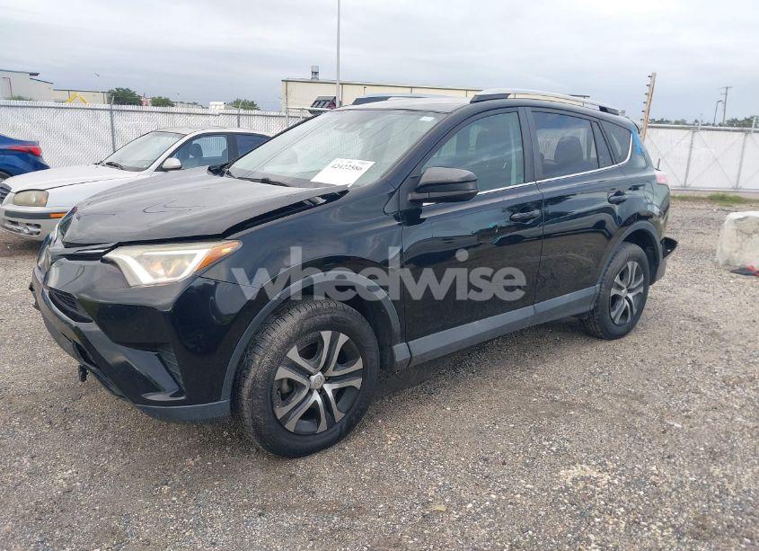 Photo 2 of 2018 Toyota Rav4 LE (VIN 2T3ZFREV2JW479999)