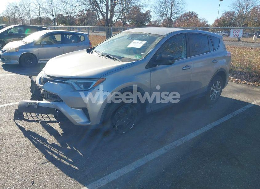 Photo 2 of 2018 Toyota Rav4 LE (VIN 2T3ZFREV6JW429087)
