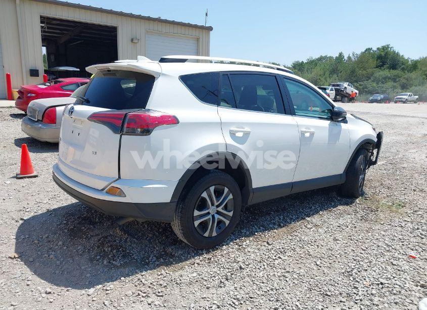Photo 4 of 2016 Toyota Rav4 LE (VIN 2T3ZFREV8GW294669)