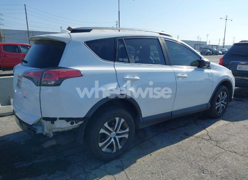 Photo 4 of 2018 Toyota Rav4 LE (VIN 2T3ZFREV8JW478209)