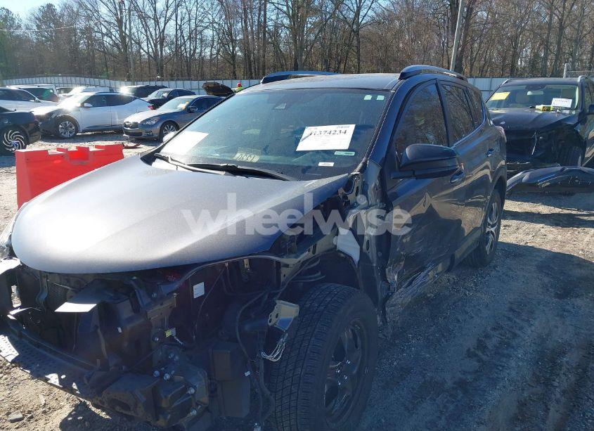 Photo 2 of 2018 Toyota Rav4 LE (VIN 2T3ZFREVXJW453912)