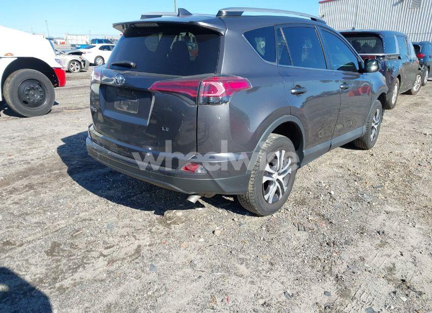 Photo 4 of 2018 Toyota Rav4 LE (VIN 2T3ZFREVXJW453912)