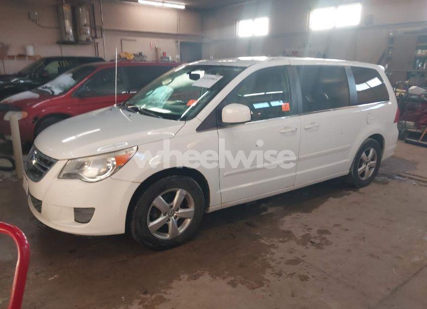 Photo 2 of 2010 Volkswagen Routan SE (VIN 2V4RW3D15AR359948)
