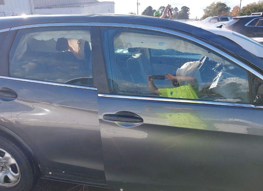 Photo 13 of 2014 Honda Cr-v LX (VIN 3CZRM3H31EG704507)