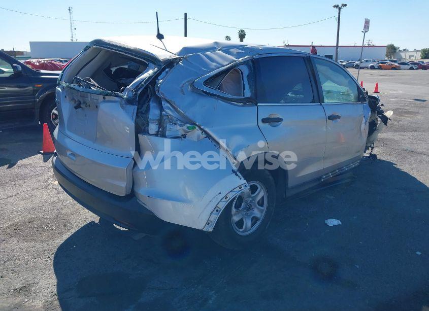 Photo 4 of 2014 Honda Cr-v LX (VIN 3CZRM3H33EG713595)