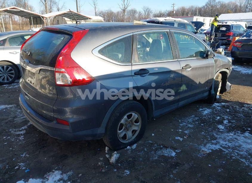 Photo 4 of 2015 Honda Cr-v LX (VIN 3CZRM3H37FG712323)