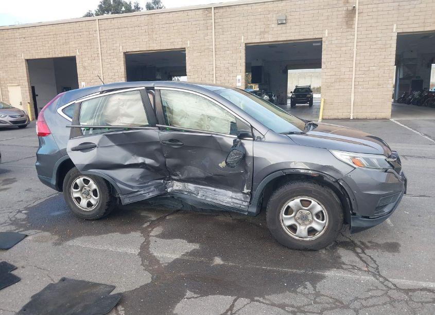 Photo 14 of 2015 Honda Cr-v LX (VIN 3CZRM3H37FG713827)