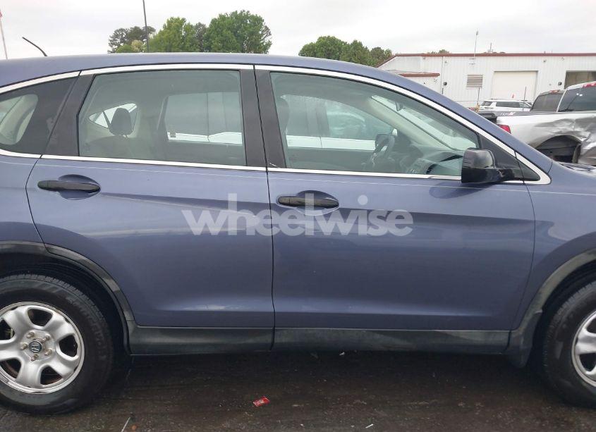 Photo 13 of 2014 Honda Cr-v LX (VIN 3CZRM3H39EG703959)