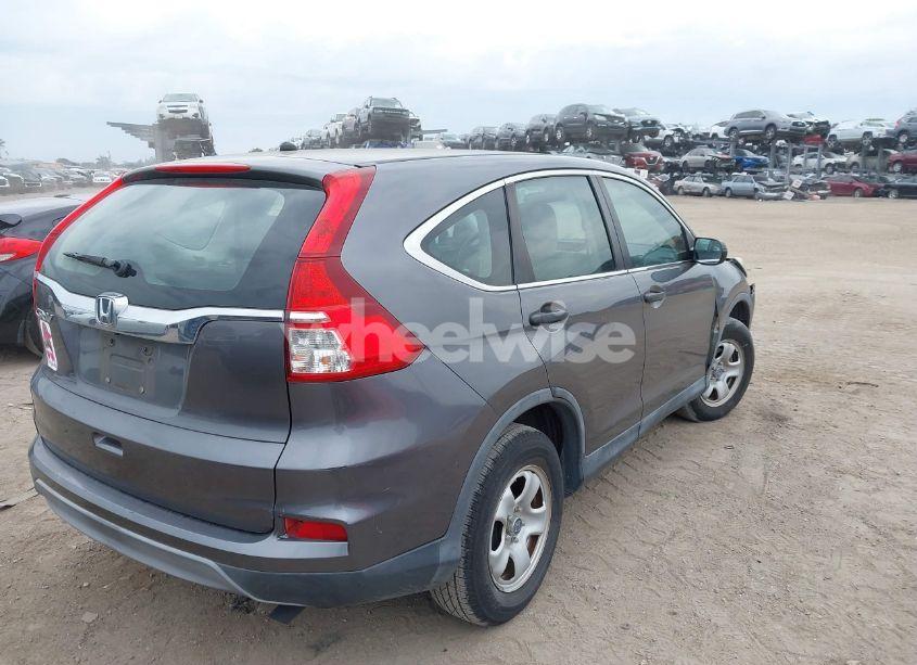Photo 4 of 2015 Honda Cr-v LX (VIN 3CZRM3H39FG709200)