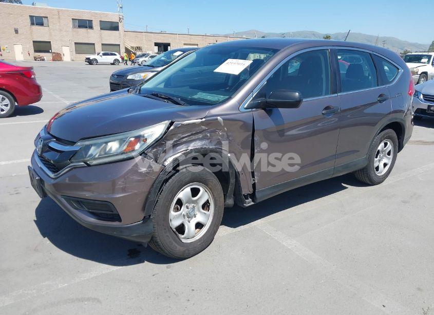 Photo 2 of 2015 Honda Cr-v LX (VIN 3CZRM3H3XFG710775)