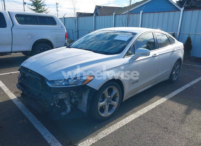 Photo 2 of 2013 Ford Fusion HYBRID SE (VIN 3FA6P0LU1DR231473)