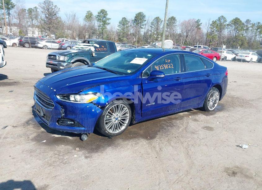 Photo 2 of 2013 Ford Fusion HYBRID SE (VIN 3FA6P0LU9DR382982)