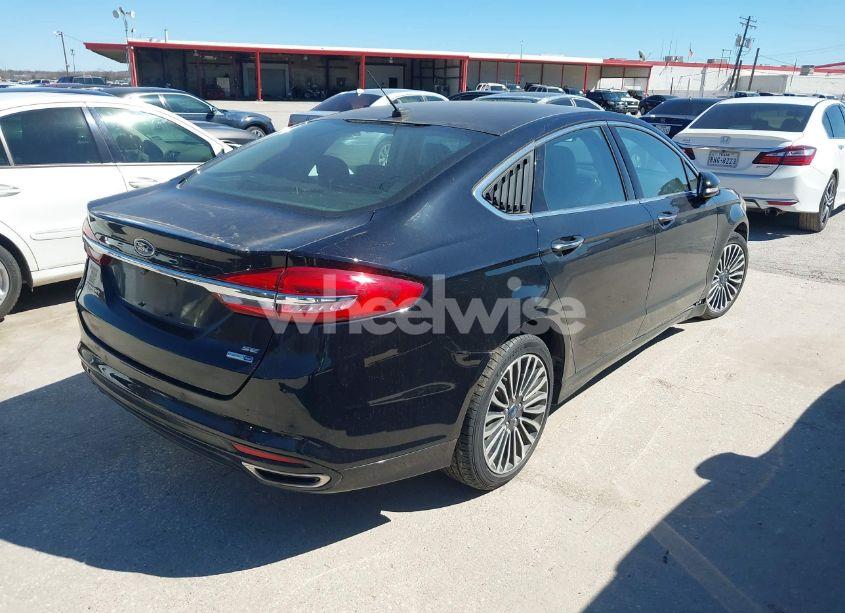 Photo 4 of 2017 Ford Fusion SE (VIN 3FA6P0T9XHR200014)