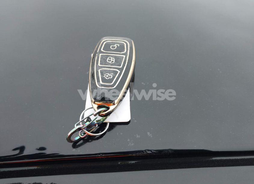 Photo 11 of 2016 Ford Fiesta TITANIUM (VIN 3FADP4CJ4GM135231)