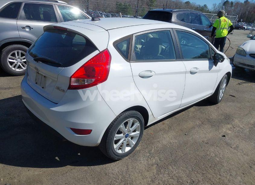 Photo 4 of 2011 Ford Fiesta SE (VIN 3FADP4EJ3BM231843)