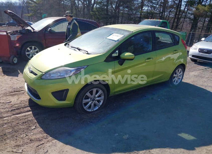 Photo 2 of 2011 Ford Fiesta SE (VIN 3FADP4EJ6BM166678)