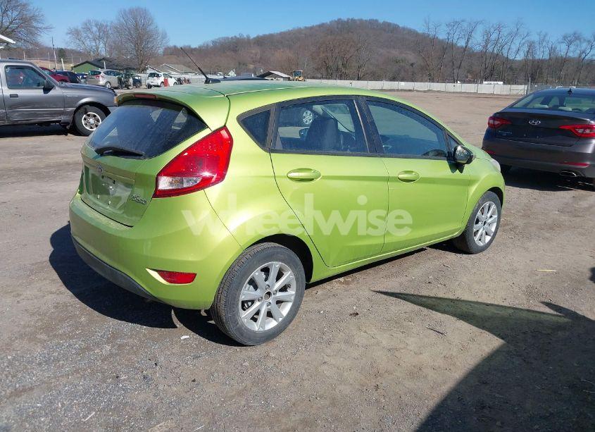 Photo 4 of 2011 Ford Fiesta SE (VIN 3FADP4EJ6BM166678)