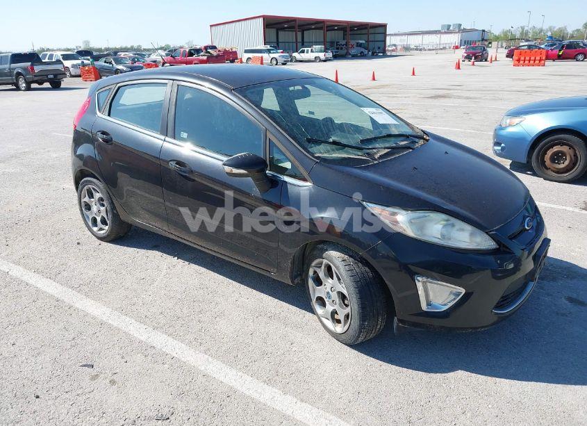 2011 Ford Fiesta SES (VIN 3FADP4FJ2BM180415) main photo