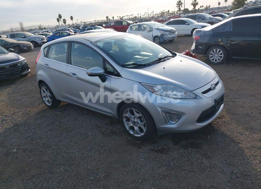 2011 Ford Fiesta SES (VIN 3FADP4FJ3BM154390) main photo