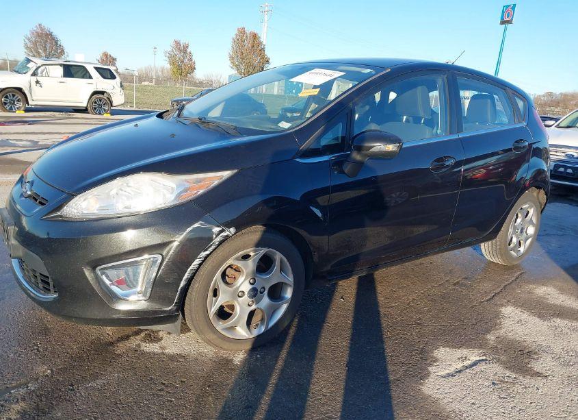 Photo 2 of 2011 Ford Fiesta SES (VIN 3FADP4FJ4BM176639)