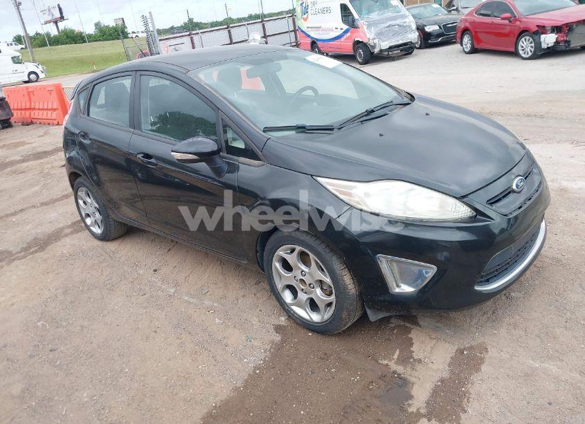 2011 Ford Fiesta SES (VIN 3FADP4FJXBM176127) main photo