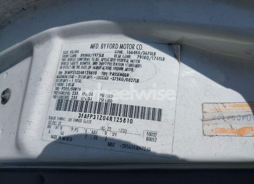 Photo 9 of 2004 Ford Focus ZX3 (VIN 3FAFP31Z04R125810)