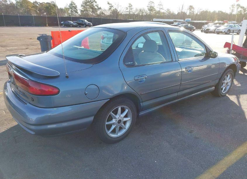 Photo 4 of 1999 Ford Contour SE (VIN 3FAFP66L0XM112417)