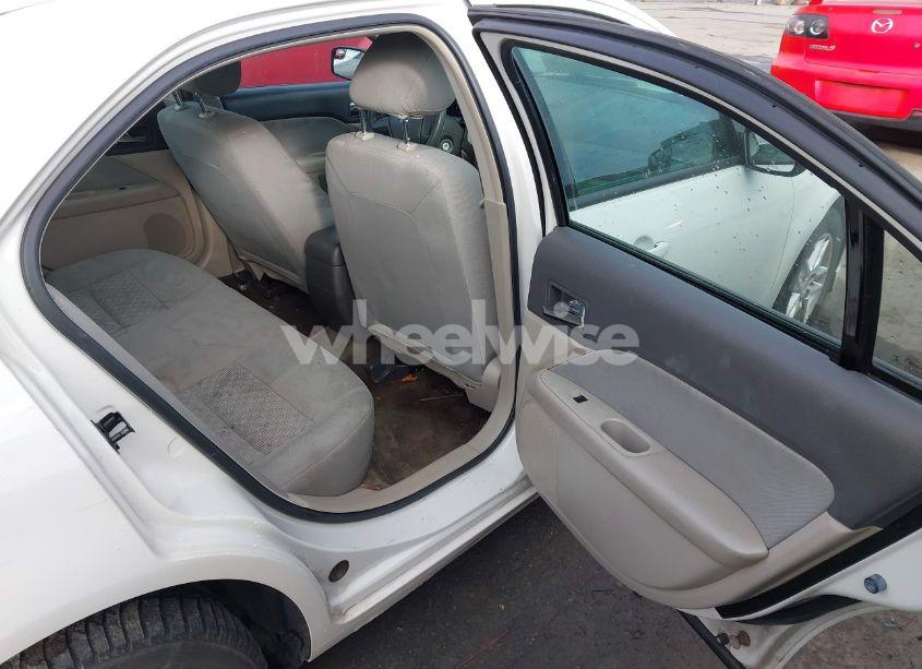 Photo 8 of 2012 Ford Fusion S (VIN 3FAHP0GA0CR297018)