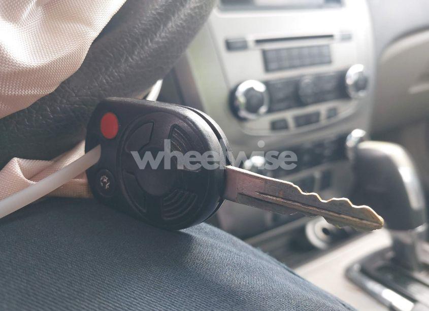 Photo 11 of 2012 Ford Fusion S (VIN 3FAHP0GA4CR200189)