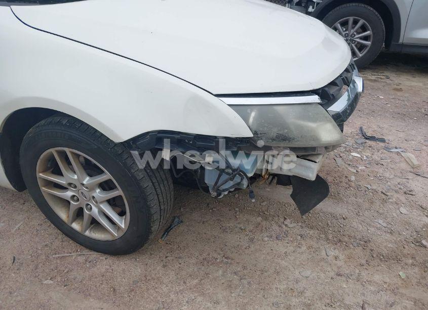 Photo 12 of 2012 Ford Fusion S (VIN 3FAHP0GA5CR184973)