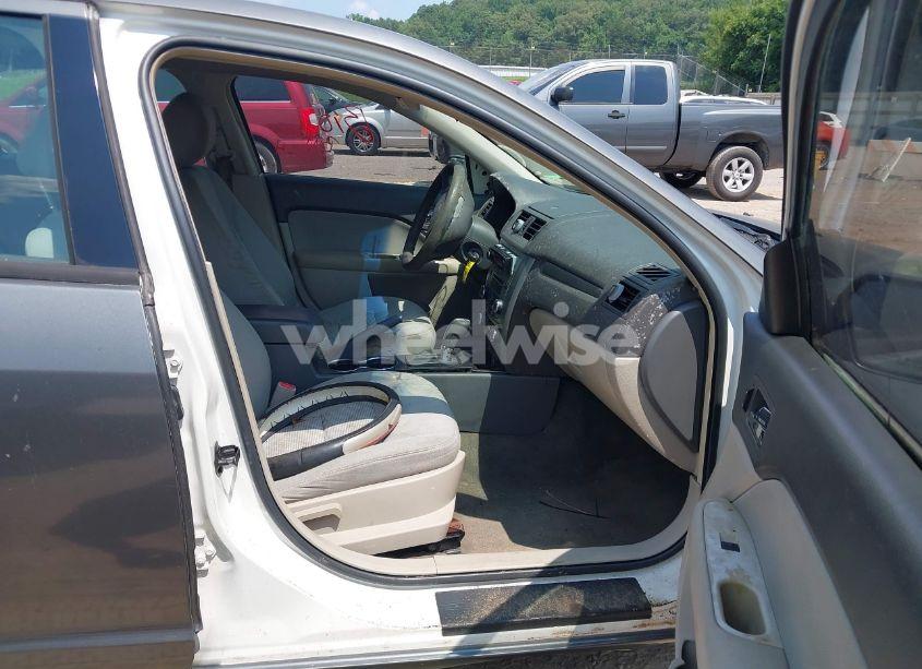 Photo 5 of 2011 Ford Fusion S (VIN 3FAHP0GA8BR239706)