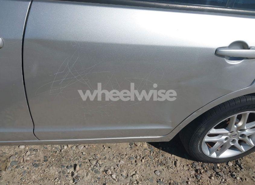 Photo 12 of 2011 Ford Fusion S (VIN 3FAHP0GA8BR337599)