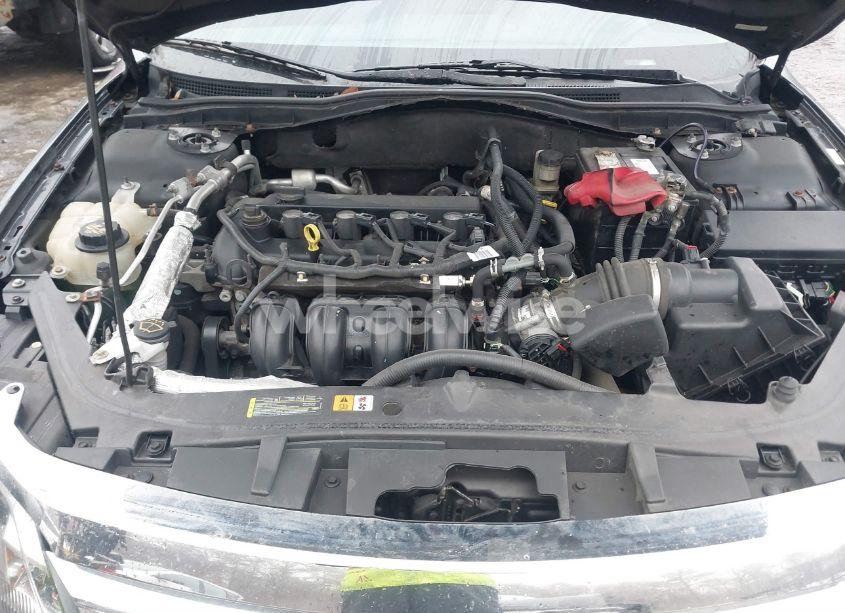 Photo 10 of 2011 Ford Fusion S (VIN 3FAHP0GAXBR143611)