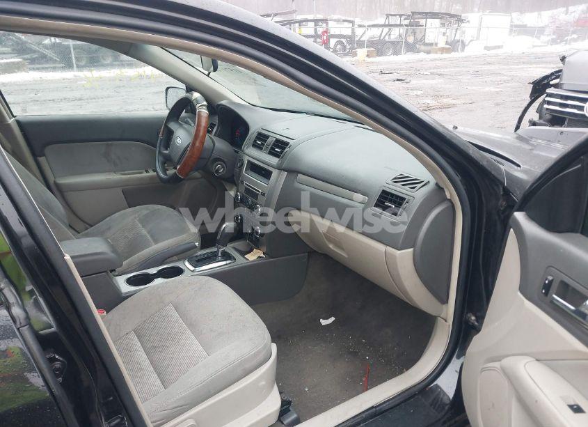 Photo 5 of 2011 Ford Fusion S (VIN 3FAHP0GAXBR143611)