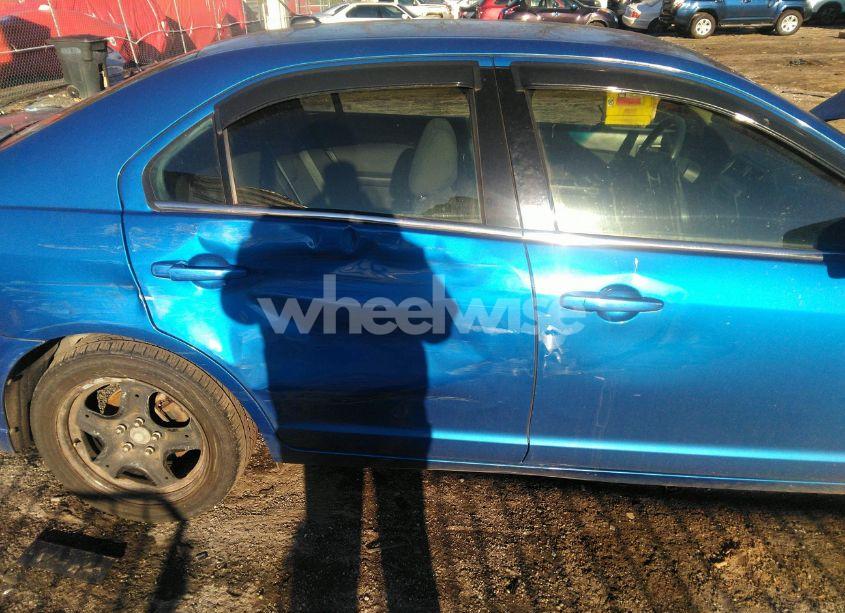 Photo 6 of 2011 Ford Fusion SE (VIN 3FAHP0HA1BR224740)